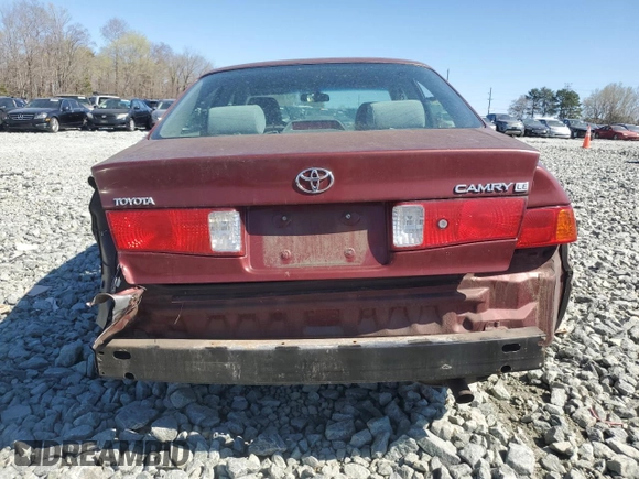 2000 Toyota Camry CE z VIN 4T1BG22K4YU645684, wystawiony jako Copart lot #50883715 z przebiegiem 263 664 mil mil oraz Szkoda całkowita • Salvage title. Historia ofert i sprzedaży dostępna na DreamBid. Obrazek 6.