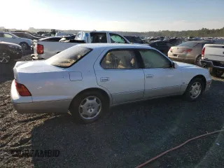 2000 Lexus LS 400 z VIN JT8BH28F0Y0175297, wystawiony jako Copart lot #75230834 z przebiegiem 293 851 mil mil oraz Szkoda całkowita • Salvage title. Historia ofert i sprzedaży dostępna na DreamBid. Obrazek 3.