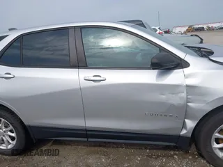 2021 Chevrolet Equinox LS z VIN 3GNAXHEV4MS134129, wystawiony jako IAAI lot #42031353 z przebiegiem 137 684 mil mil oraz . Historia ofert i sprzedaży dostępna na DreamBid. Obrazek 13.