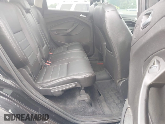 2015 Ford Escape Titanium z VIN 1FMCU0JX7FUB00462, wystawiony jako IAAI lot #42532943 z przebiegiem 88 623 mil mil oraz . Historia ofert i sprzedaży dostępna na DreamBid. Obrazek 8.