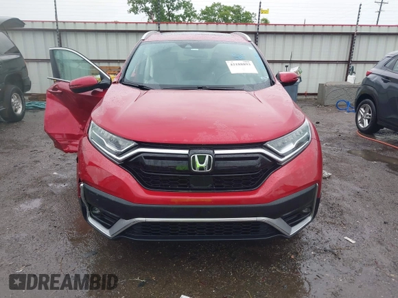 2021 Honda CR-V Touring with VIN 2HKRW2H9XMH663315, listed as a IAAI auction lot 42188893 with 26,203 mi miles and . Bid and sale history available at DreamBid. Image 12.