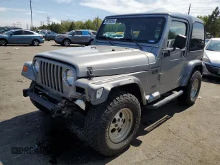 2002 Jeep Wrangler X with VIN 1J4FA39S32P708163, listed as a Copart auction lot 69703254 with 119,843 mi miles and Salvage Title. Bid and sale history available at carsss.com. Image 1.
