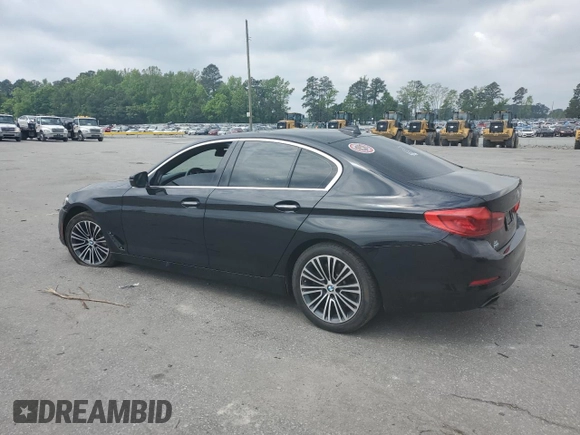 2018 BMW 5 Series 540i with VIN WBAJE5C54JWA93338, listed as a Copart auction lot 54312385 with 77,537 mi miles and Salvage title. Bid and sale history available at DreamBid. Image 2.
