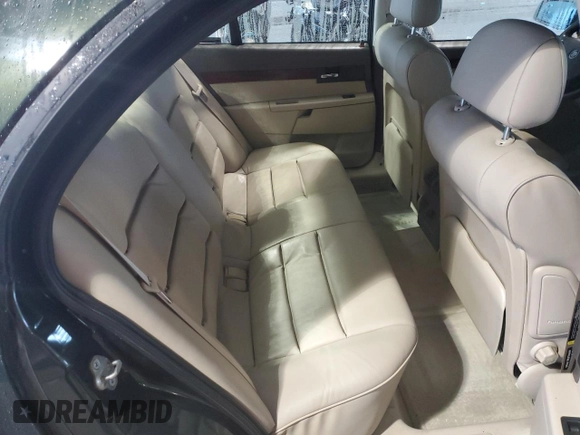 2000 Cadillac Catera z VIN W06VR54R7YR124650, wystawiony jako Copart lot #49602314 z przebiegiem 77 800 mil mil oraz Nie do naprawy • Non repairable. Historia ofert i sprzedaży dostępna na DreamBid. Obrazek 10.