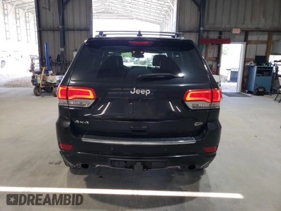 2015 Jeep Grand Cherokee Overland with VIN 1C4RJFCG0FC783375, listed as a Copart auction lot 61966725 with 191,478 mi miles and Salvage title. Bid and sale history available at DreamBid. Image 6.