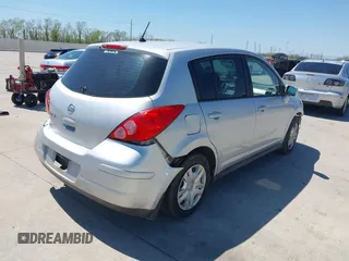 2010 Nissan Versa 1.8 S with VIN 3N1BC1CP7AL433675, listed as a IAAI auction lot 41879386 with 219,794 mi miles. Bid and sale history available at carsss.com. Image 4.