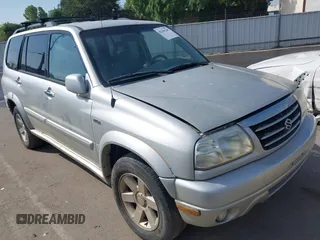 2001 Suzuki XL7 Standard z VIN JS3TX92V514103609, wystawiony jako IAAI lot #42146285 z przebiegiem 218 524 mil mil oraz . Historia ofert i sprzedaży dostępna na DreamBid. Obrazek 1.