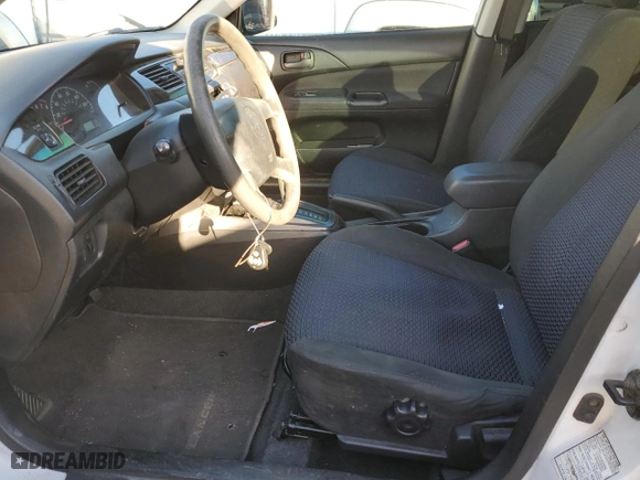 2003 Mitsubishi Lancer LS with VIN JA3AJ36E83U086319, listed as a Copart auction lot 80986464 with 130,043 mi miles and Salvage Title. Bid and sale history available at carsss.com. Image 7.