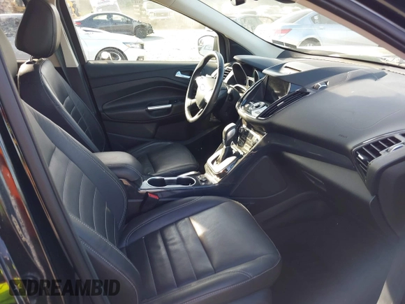 2016 Ford Escape Titanium with VIN 1FMCU9J94GUA06028, listed as a IAAI auction lot 42102769 with 88,278 mi miles. Bid and sale history available at carsss.com. Image 5.