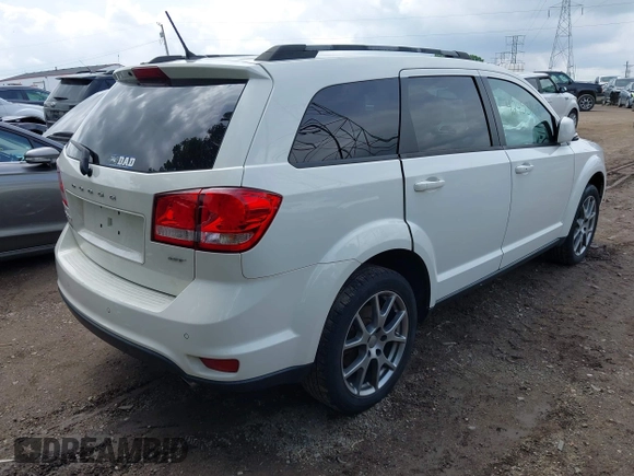 2017 Dodge Journey GT z VIN 3C4PDDEG6HT615327, wystawiony jako IAAI lot #42453168 z przebiegiem 127 569 mil mil oraz . Historia ofert i sprzedaży dostępna na DreamBid. Obrazek 4.