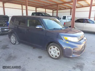 2012 Scion xB with VIN JTLZE4FE0CJ024692, listed as a IAAI auction lot 41844965 with 228,098 mi miles. Bid and sale history available at carsss.com. Image 1.
