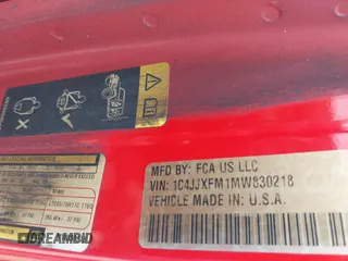 2021 Jeep Wrangler Unlimited Rubicon with VIN 1C4JJXFM1MW830218, listed as a IAAI auction lot 39934037 with Not provided miles and . Bid and sale history available at DreamBid. Image 9.