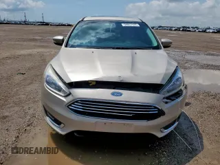 2018 Ford Focus Titanium z VIN 1FADP3J26JL279443, wystawiony jako Copart lot #58837435 z przebiegiem 136 538 mil mil oraz Szkoda całkowita • Salvage title. Historia ofert i sprzedaży dostępna na DreamBid. Obrazek 5.