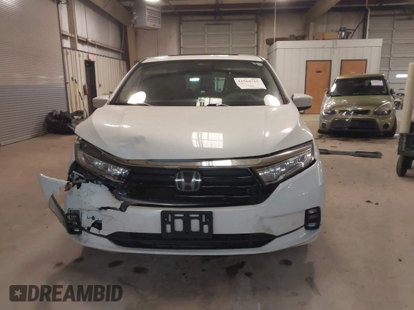 2021 Honda Odyssey Touring with VIN 5FNRL6H80MB026908, listed as a IAAI auction lot 41564765 with 116,453 mi miles. Bid and sale history available at carsss.com. Image 12.