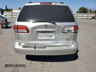 2002 Toyota Sienna LE with VIN 4T3ZF13CX2U458385, listed as a Copart auction lot 69523254 with 187,836 mi miles and Salvage Title. Bid and sale history available at carsss.com. Image 6.