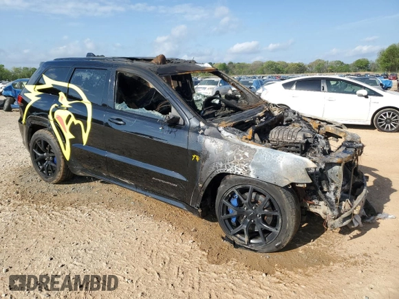 2018 Jeep Grand Cherokee Trackhawk with VIN 1C4RJFN93JC223647, listed as a Copart auction lot 51947265 with Not provided miles and Non repairable. Bid and sale history available at DreamBid. Image 4.