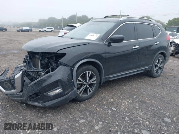 2017 Nissan Rogue SL with VIN JN8AT2MT9HW407176, listed as a IAAI auction lot 41406240 with 93,657 mi miles and . Bid and sale history available at DreamBid. Image 17.