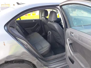 2011 Volkswagen Jetta Sedan SE w/Convenience & Sunroof with VIN 3VWDX7AJ9BM306477, listed as a IAAI auction lot 42144071 with 139,970 mi miles. Bid and sale history available at carsss.com. Image 8.