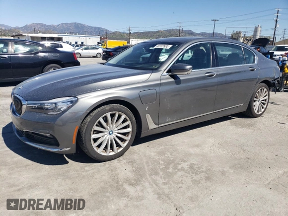 2018 BMW 7 Series 740e xDrive with VIN WBA7J2C55JG938385, listed as a Copart auction lot 49109985 with 81,567 mi miles and Salvage Title. Bid and sale history available at DreamBid. Image 1.