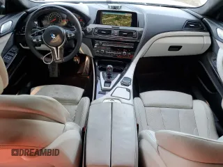 2016 BMW M6 z VIN WBS6E9C51GG437202, wystawiony jako Copart lot #71389434 z przebiegiem 80 673 mil mil oraz Szkoda całkowita • Salvage title. Historia ofert i sprzedaży dostępna na DreamBid. Obrazek 8.