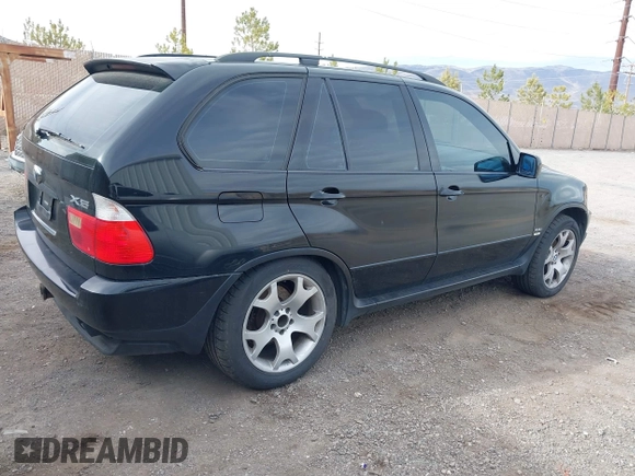 2001 BMW X5 4.4i with VIN WBAFB33531LH22723, listed as a IAAI auction lot 41834755 with 184,082 mi miles. Bid and sale history available at carsss.com. Image 4.