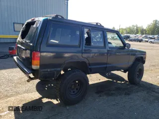 2000 Jeep Cherokee z VIN 1J4FF48S3YL180200, wystawiony jako Copart lot #55994215 z przebiegiem 209 182 mil mil oraz Szkoda całkowita • Salvage title. Historia ofert i sprzedaży dostępna na DreamBid. Obrazek 3.