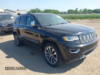 2017 Jeep Grand Cherokee Overland with VIN 1C4RJFCG1HC883343, listed as a IAAI auction lot 42644732 with 179,646 mi miles and . Bid and sale history available at DreamBid. Image 1.