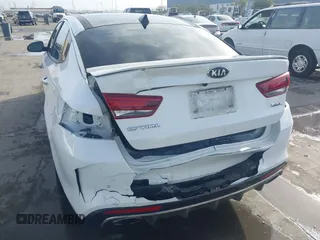 2016 Kia Optima SXL Turbo with VIN 5XXGV4L20GG074869, listed as a IAAI auction lot 41212808 with 82,884 mi miles. Bid and sale history available at carsss.com. Image 6.