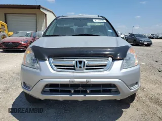 2002 Honda CR-V LX with VIN JHLRD68512C025394, listed as a Copart auction lot 67161964 with 143,660 mi miles and Salvage Title. Bid and sale history available at DreamBid. Image 5.