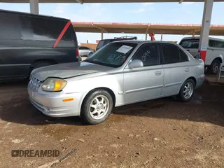 2003 Hyundai Accent GL with VIN KMHCG45C93U476176, listed as a IAAI auction lot 41940608 with 212,264 mi miles. Bid and sale history available at carsss.com. Image 2.