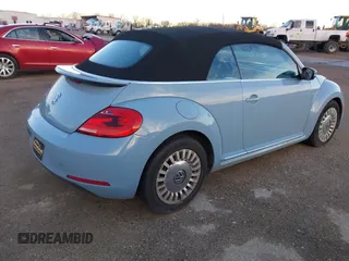 2013 Volkswagen Beetle 2.5L with VIN 3VW5P7AT9DM811542, listed as a IAAI auction lot 41683361 with 79,018 mi miles and . Bid and sale history available at DreamBid. Image 4.