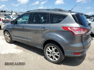 2013 Ford Escape SEL with VIN 1FMCU0HX2DUB77937, listed as a Copart auction lot 55948845 with 137,000 mi miles and Clean Title. Bid and sale history available at DreamBid. Image 2.
