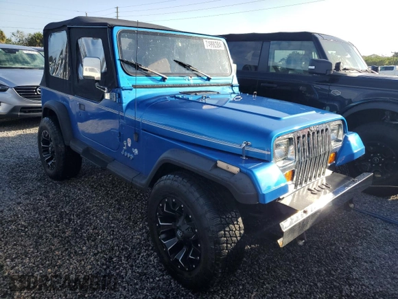 1992 Jeep Wrangler z VIN 2J4FY19P6NJ559597, wystawiony jako Copart lot #74990384 z przebiegiem 150 298 mil mil oraz Szkoda całkowita • Salvage title. Historia ofert i sprzedaży dostępna na DreamBid. Obrazek 4.