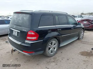 2011 Mercedes-Benz GL-Class GL 450 with VIN 4JGBF7BE4BA629312, listed as a IAAI auction lot 41384945 with 127,239 mi miles. Bid and sale history available at carsss.com. Image 4.
