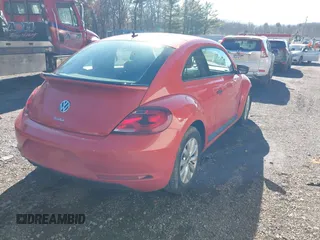 2017 Volkswagen Beetle 1.8T Fleet with VIN 3VWF17AT7HM618771, listed as a IAAI auction lot 41595088 with 67,943 mi miles. Bid and sale history available at carsss.com. Image 4.