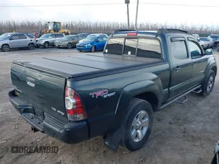 2010 Toyota Tacoma with VIN 5TEMU4FN2AZ702015, listed as a IAAI auction lot 41663558 with 159,758 mi miles and . Bid and sale history available at DreamBid. Image 4.