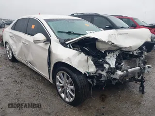 2014 Cadillac XTS Luxury z VIN 2G61M5S32E9296944, wystawiony jako IAAI lot #41558450 z przebiegiem Nie podano mil oraz . Historia ofert i sprzedaży dostępna na DreamBid. Obrazek 1.