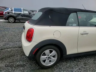 2019 MINI Convertible Cooper z VIN WMWWG5C54K3F79764, wystawiony jako Copart lot #48692085 z przebiegiem 94 211 mil mil oraz Szkoda całkowita • Salvage title. Historia ofert i sprzedaży dostępna na DreamBid. Obrazek 13.