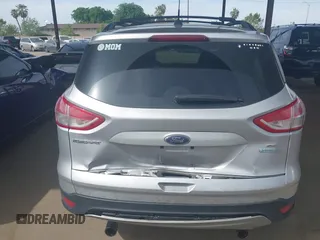 2013 Ford Escape SE with VIN 1FMCU0GX5DUB97293, listed as a IAAI auction lot 42044696 with 182,746 mi miles and . Bid and sale history available at DreamBid. Image 16.