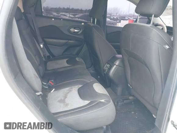 2016 Jeep Cherokee Altitude with VIN 1C4PJLAB4GW376723, listed as a IAAI auction lot 41593248 with 96,940 mi miles and . Bid and sale history available at DreamBid. Image 8.