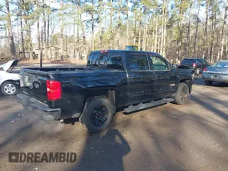 2015 Chevrolet Silverado 1500 LTZ with VIN 3GCUKSEC0FG497341, listed as a IAAI auction lot 41829608 with 96,805 mi miles. Bid and sale history available at carsss.com. Image 4.