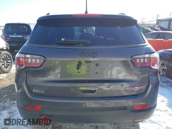 2019 Jeep Compass Trailhawk with VIN 3C4NJDDB3KT602029, listed as a IAAI auction lot 41618243 with 73,088 mi miles and . Bid and sale history available at DreamBid. Image 17.