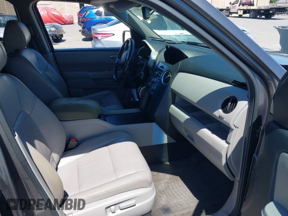 2013 Honda Pilot EX-L z VIN 5FNYF4H59DB006637, wystawiony jako IAAI lot #42224475 z przebiegiem 106 600 mil mil oraz . Historia ofert i sprzedaży dostępna na DreamBid. Obrazek 5.
