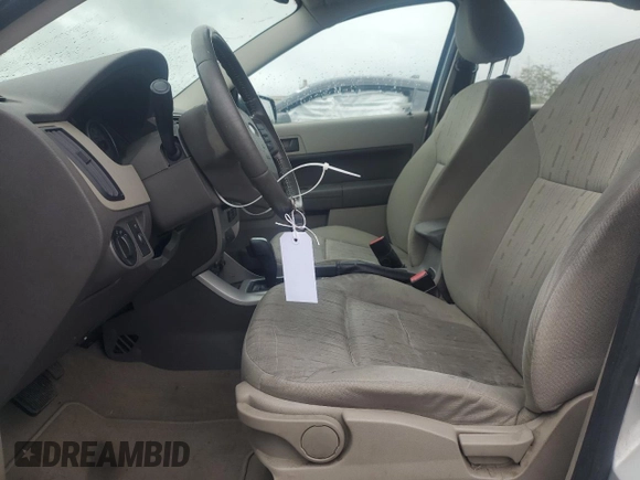 2010 Ford Focus SE with VIN 1FAHP3FN6AW133885, listed as a Copart auction lot 53735205 with 105,849 mi miles and Salvage Title. Bid and sale history available at DreamBid. Image 7.