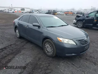 2009 Toyota Camry LE z VIN 4T1BK46K49U093612, wystawiony jako IAAI lot #41847395 z przebiegiem 250 383 mil mil oraz . Historia ofert i sprzedaży dostępna na DreamBid. Obrazek 1.