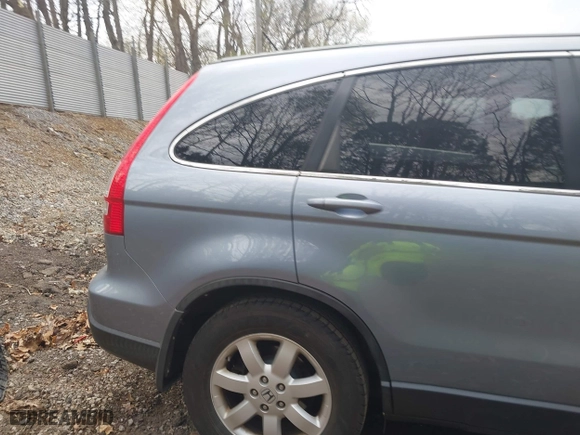 2009 Honda CR-V EX-L with VIN JHLRE48719C007622, listed as a IAAI auction lot 41999801 with 158,976 mi miles. Bid and sale history available at carsss.com. Image 18.