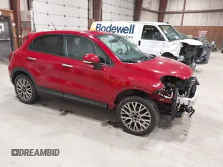 2016 FIAT 500X Trekking z VIN ZFBCFYCT7GP512617, wystawiony jako IAAI lot #42344947 z przebiegiem 146 656 mil mil oraz . Historia ofert i sprzedaży dostępna na DreamBid. Obrazek 1.