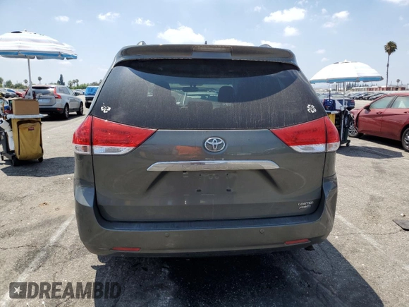 2012 Toyota Sienna XLE with VIN 5TDDK3DC1CS043460, listed as a Copart auction lot 64900495 with 190,187 mi miles and Clean title. Bid and sale history available at DreamBid. Image 6.