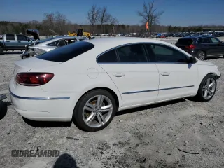 2013 Volkswagen CC Sport with VIN WVWBN7AN6DE539681, listed as a Copart auction lot 45477985 with 121,128 mi miles and Salvage Title. Bid and sale history available at DreamBid. Image 3.