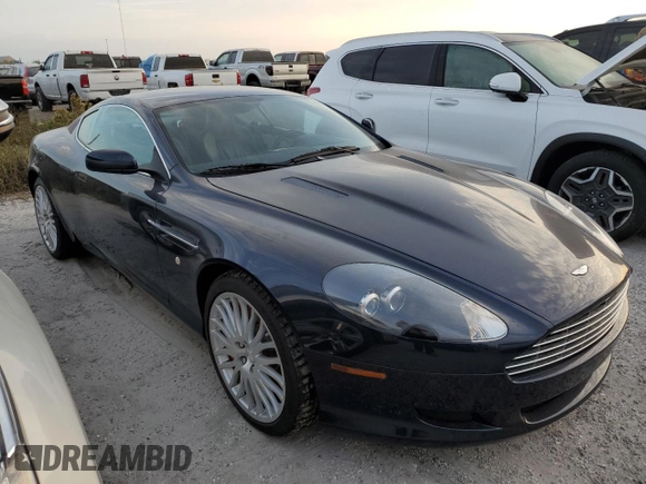 2009 Aston Martin DB9 z VIN SCFAD01E79GA12139, wystawiony jako Copart lot #76241164 z przebiegiem Nie podano mil oraz Szkody całkowita. Historia ofert i sprzedaży dostępna na DreamBid. Obrazek 4.